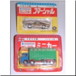 Two styles of Japanese Lone Star blister packs. The car has a plastic road sign included, while the Foden truck is labelled for Japanese National Railways.